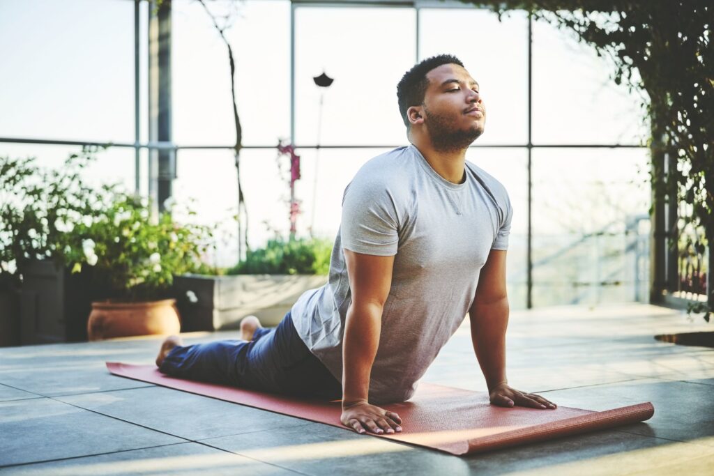 A fitness enthusiast doing yoga 